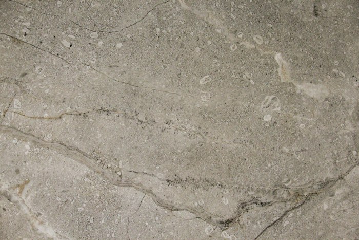 Textured natural-stone porcelain